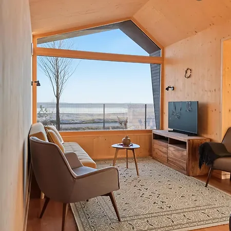 Semesterbostad Futopia Strandhaeuser Mit Seeblick, Sauna & Hot Tub